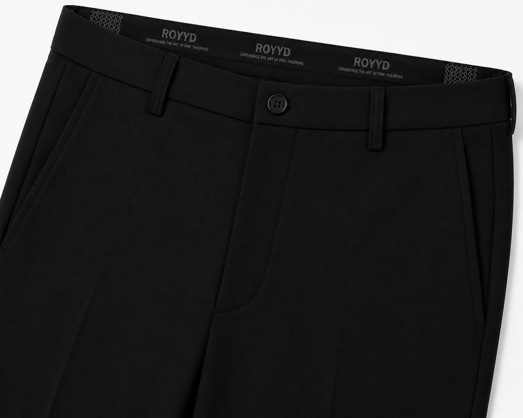 Black formal trousers by ROYYD, tailored fit with sleek fabric, shown on a hanger with a clean background.